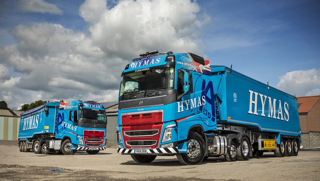 2 blue hymas Ltd company lorries